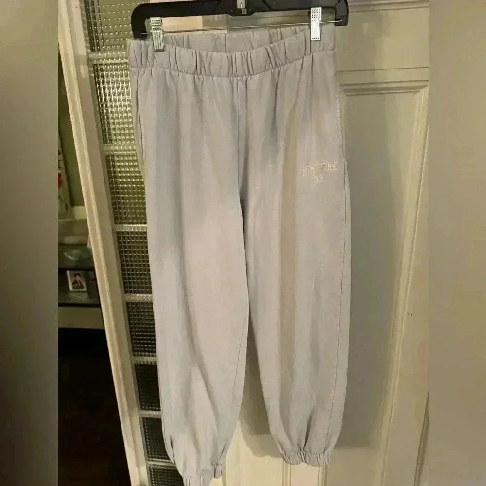 Brandy Melville Women’s Light Blue Jogging Pants. New York On Pant Leg